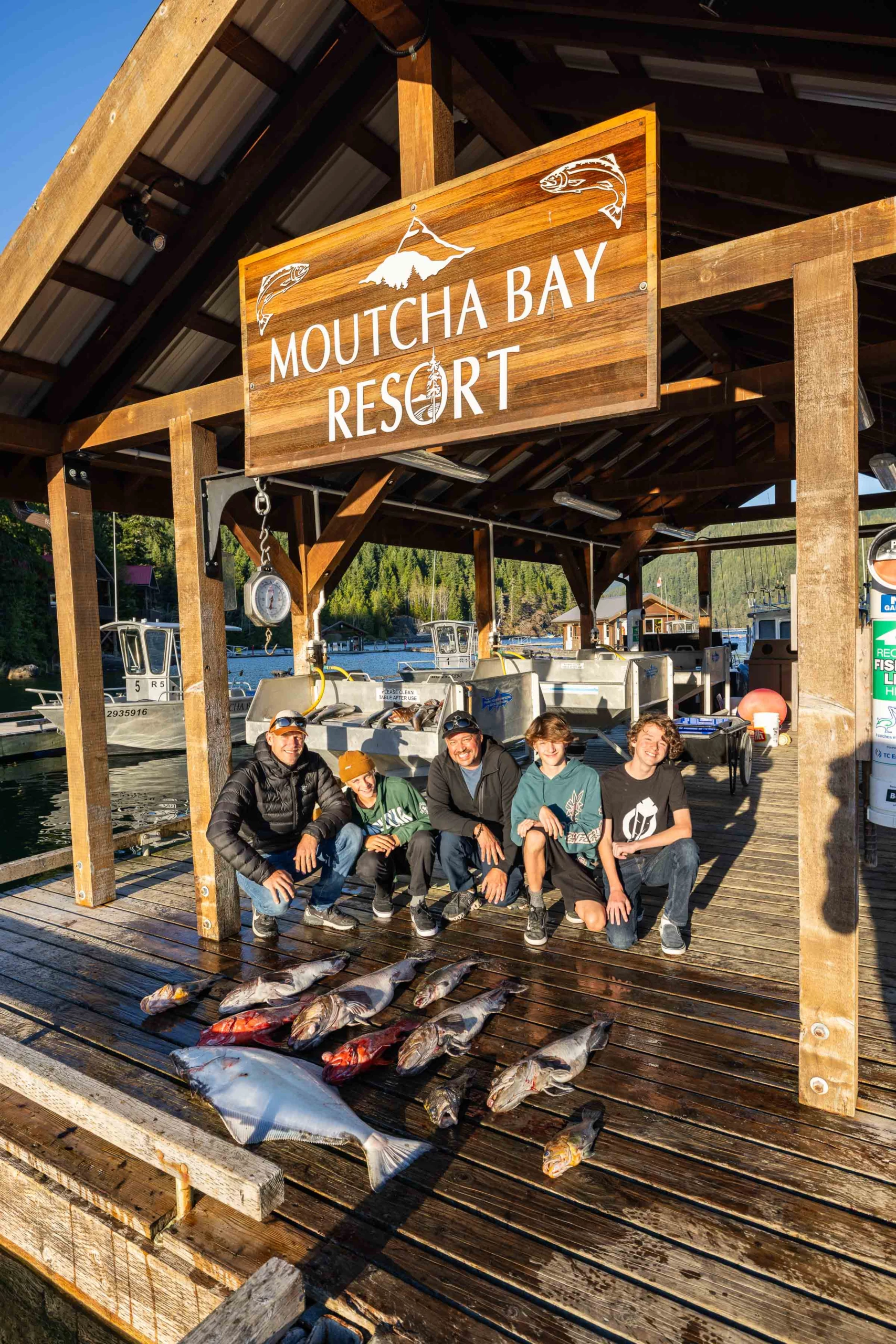 Group of guests with large catch of fish at Mouchta Bay Resort